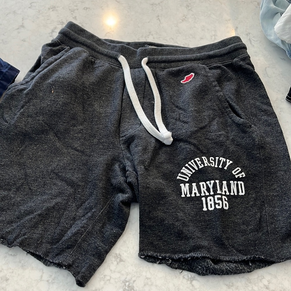 University of Maryland 1856 gym shorts with 3 pockets.  Sweatpants shorts